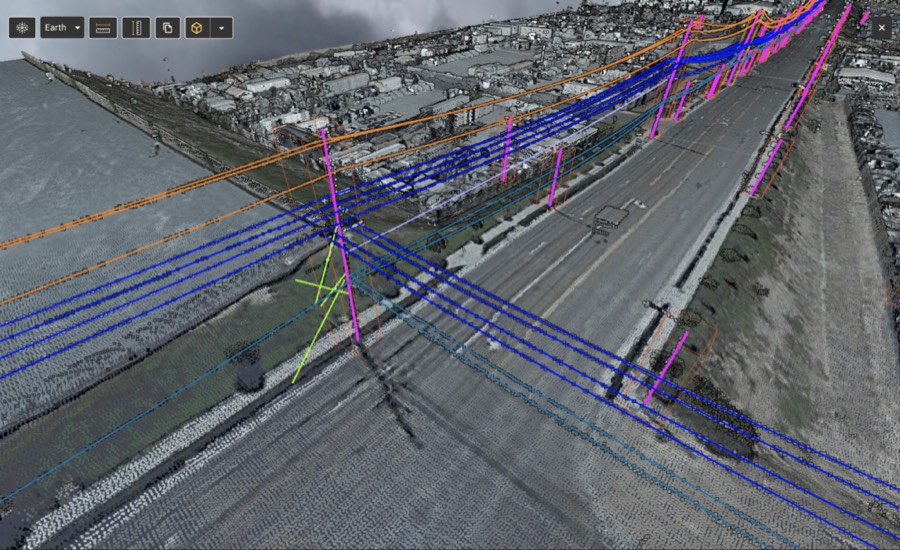 A massive streaming point cloud of a street with vectorized power lines and poles drawn over it